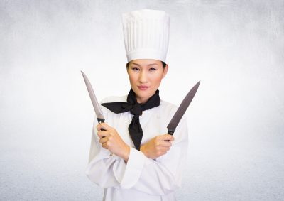 29377506_composite-image-of-chef-with-knives-against-white-background